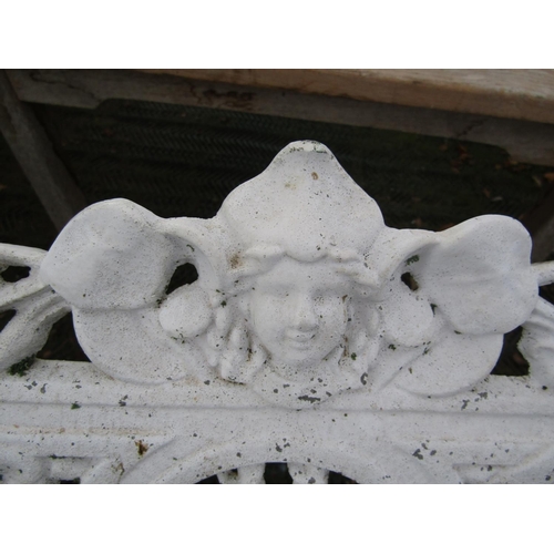 2072 - A Coalbrookdale style two seat garden bench, the cream painted cast alloy frame with decorative pier... 