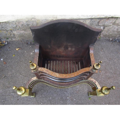 2086 - A Georgian design steel and brass fire basket with serpentine front, pierced grill, urn finials and ... 