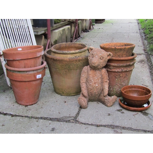 2023 - A small quantity of weathered terracotta flower pots and planters of varying size and design, togeth... 