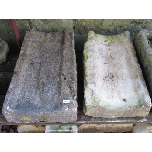 2030 - Two weathered natural stone shutes, slight variant in size, the largest 82 cm long x 44 cm wide