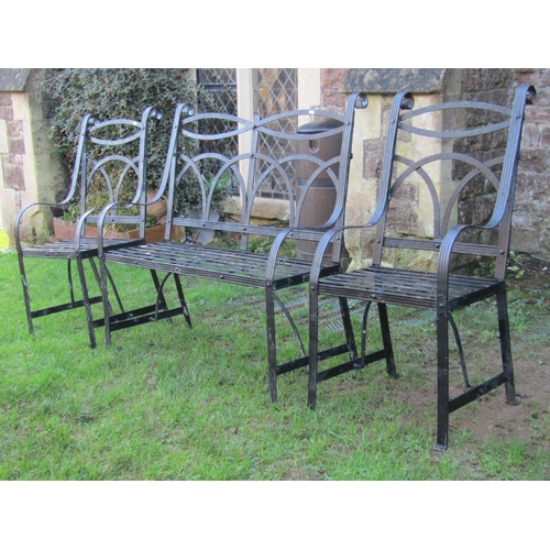 2041 - A Regency style strap work two seat garden bench with lattice and scrolled detail, 100 cm wide, toge... 