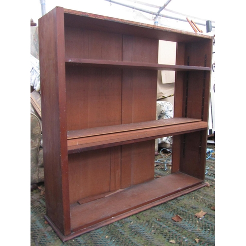 2057 - A 19th century mahogany library bookcase in two sections, the upper with segmented open adjustable s... 