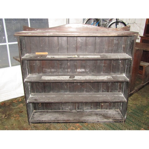 2058 - A vintage child's oak school desk and combined seat together with an early 20th century oak students... 