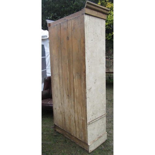 2066 - A Victorian painted pine single wardrobe with removable moulded cornice over a three quarter length ... 