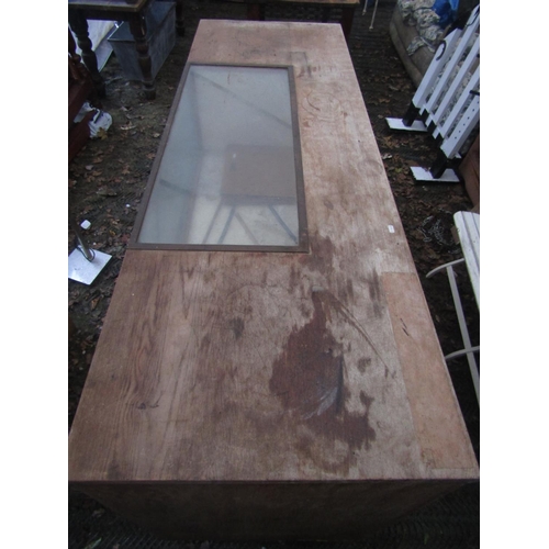 2073 - A vintage oak haberdashery cabinet/counter incorporating a brass framed and glazed centralised cabin... 