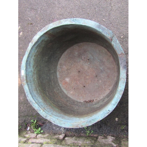 2078 - An old weathered verdigris copper with riveted seams and flared rim (with repair and drilled base), ... 