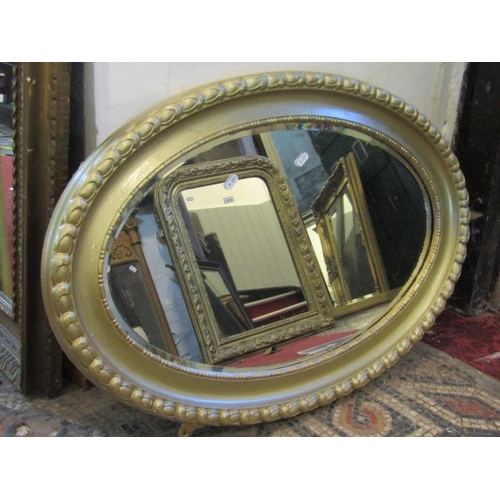 2141 - Three gilt framed wall mirrors of varying size and design