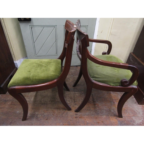 2268 - A matched set of six (4+2) Regency and Regency style dining chairs, raised on sabre shaped supports,... 