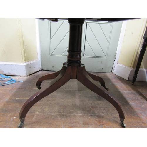 2274 - A Regency mahogany breakfast table, the rectangular top to seat four, raised on a turned pillar and ... 