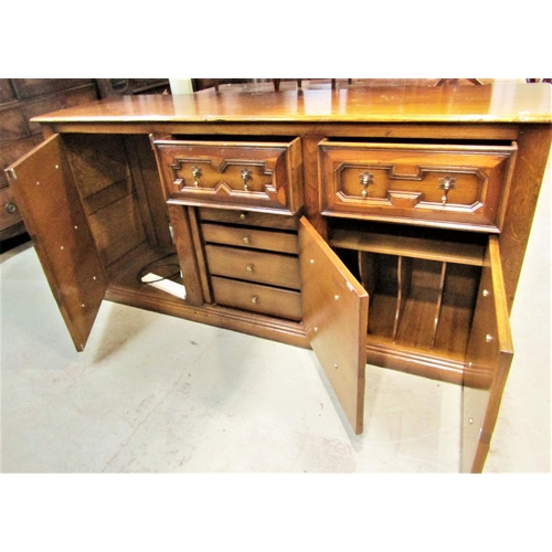 2290 - A good quality reproduction oak dresser base in the Jacobean style with distressed finish, fitted wi... 