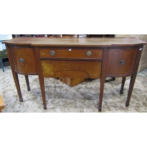 2296 - An Edwardian mahogany breakfront sideboard in the Georgian style, with satinwood cross banding and b... 