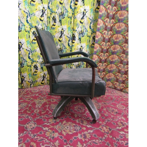 2310A - Vintage industrial/machinists desk chair, with green vinyl upholstery upon a cast aluminium four spo... 