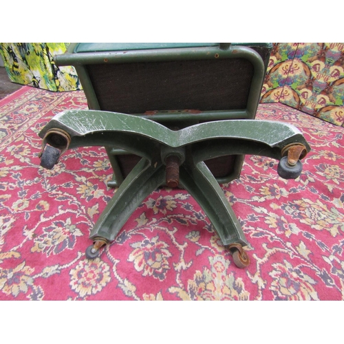 2310A - Vintage industrial/machinists desk chair, with green vinyl upholstery upon a cast aluminium four spo... 