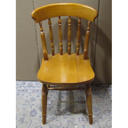 2191 - A set of eight modern Windsor stained beechwood dining chairs with turned spindle backs