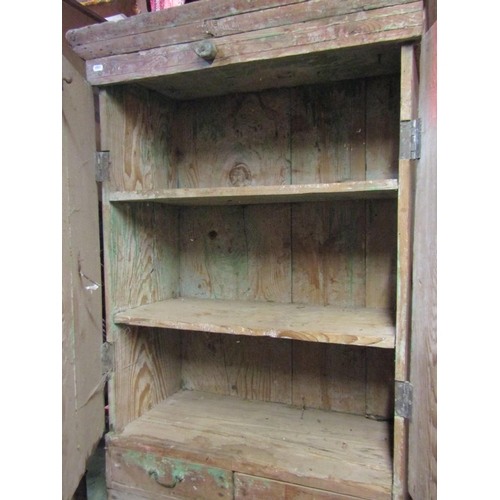 2300 - A rustic antique pine side cupboard probably Indian freestanding and enclosed by a pair of three qua... 