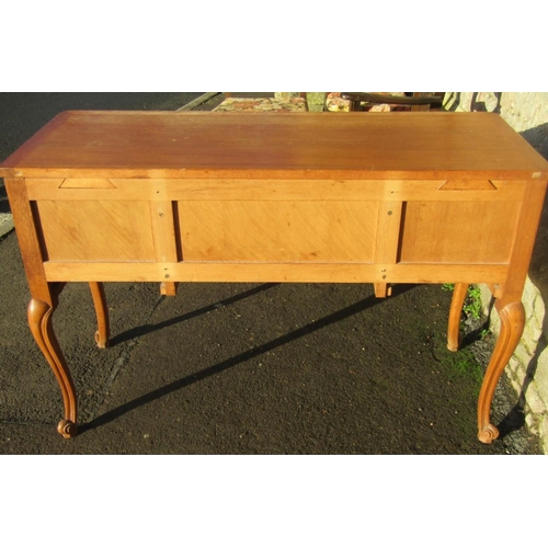 2149 - A vintage French light oak kneehole dressing table fitted with an arrangement of five frieze drawers... 