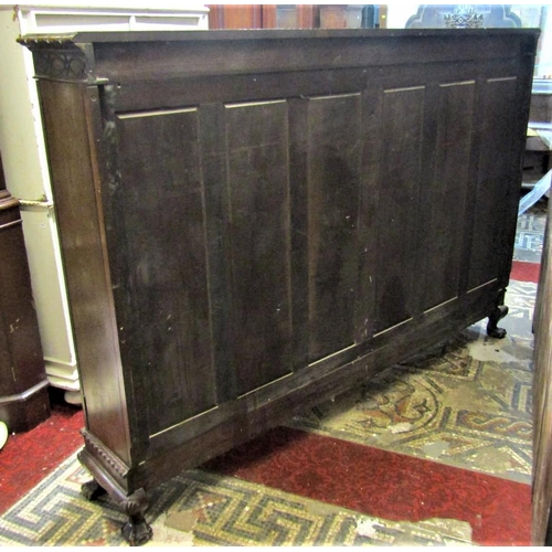 2154 - An Edwardian Chippendale revival walnut side cabinet with moulded and blind fret frieze over four as... 