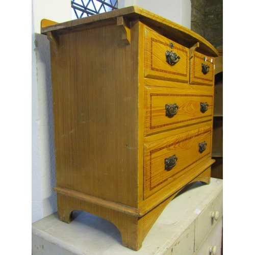 2228 - A low Edwardian pine bedroom chest of two short over two long drawers with simulated wood grained an... 