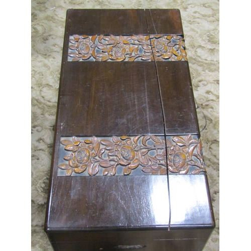 2234 - An Eastern camphor wood chest with hinged lid and carved rose banded detail, 102 cm long x 51 cm wid... 