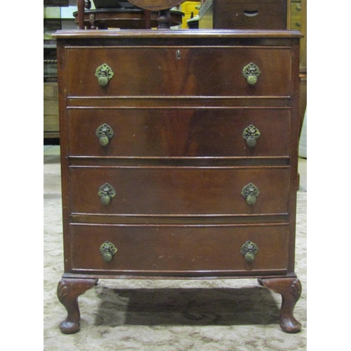 2254 - A reproduction Georgian style mahogany veneered bow fronted bedroom chest of four long graduated dra... 