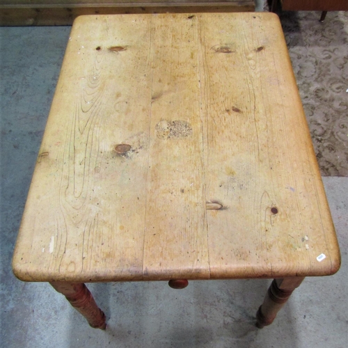 2264 - A Victorian stripped pine kitchen table of rectangular form with moulded outline, rounded corners an... 