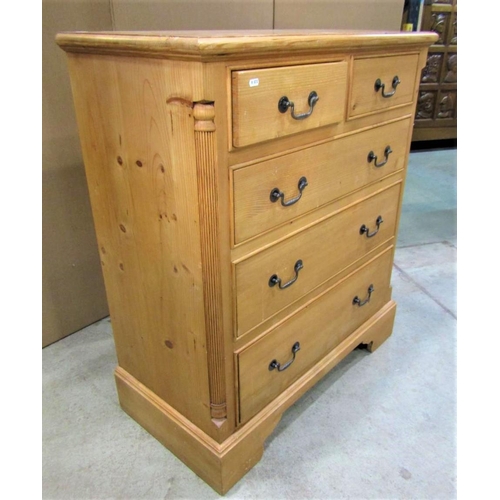 2280 - A Georgian style stripped pine bedroom chest of two short over three long graduated drawers, flanked... 