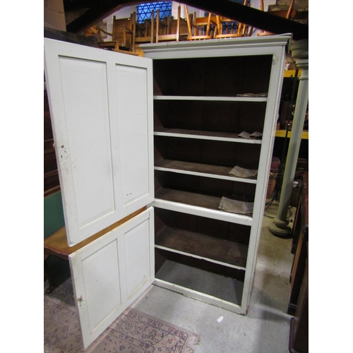 2302 - An old painted pine kitchen/housekeepers cupboard enclosed by two panelled doors with shelved interi... 