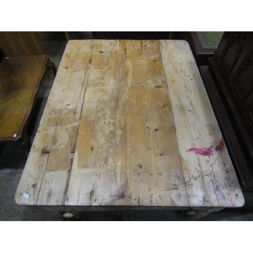 2308 - A Victorian stripped pine farmhouse kitchen table of rectangular form fitted with an end frieze draw... 