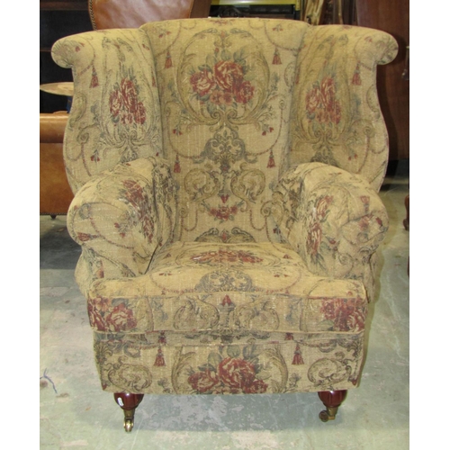 2325 - A substantial contemporary Georgian style wing armchair with upholstered finish and loose T shaped c... 