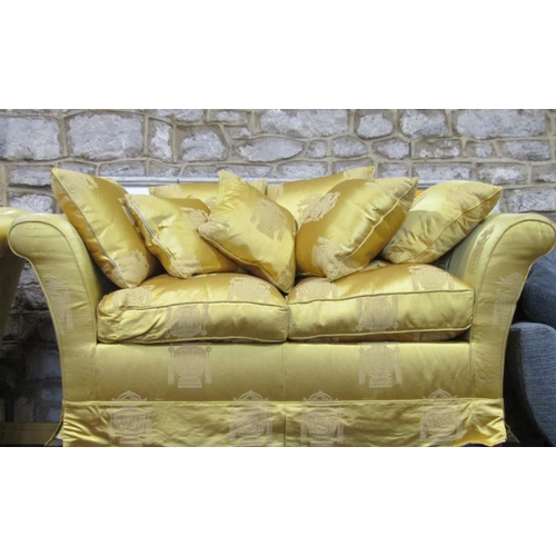 2394 - A pair of contemporary two seat sofas with swept and rolled arms and yellow ground repeating Chinese... 