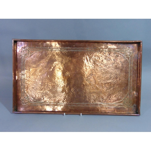 532 - An Arts & Crafts copper tray of rectangular form with Celtic knot design (unmarked), 53 cm x 30 cm