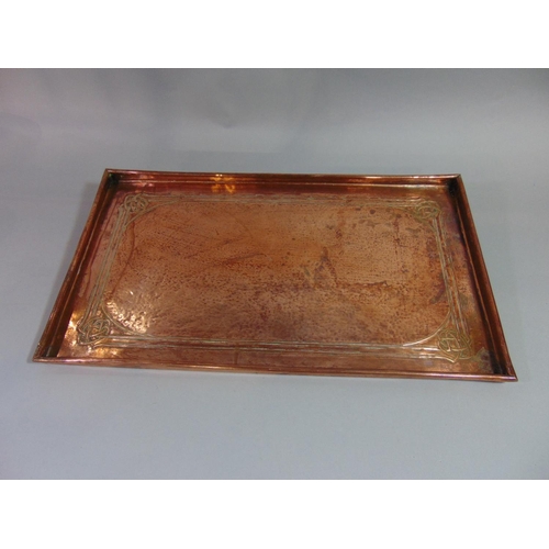 532 - An Arts & Crafts copper tray of rectangular form with Celtic knot design (unmarked), 53 cm x 30 cm