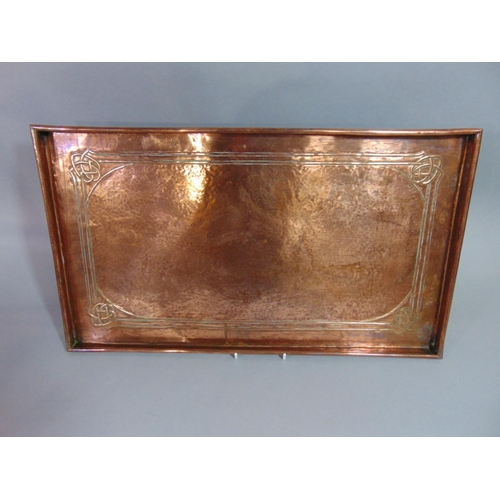 532 - An Arts & Crafts copper tray of rectangular form with Celtic knot design (unmarked), 53 cm x 30 cm