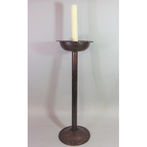 537 - Possibly Goberg, an Arts & Crafts steel candle stand with simple cylindrical stem and domed disc sha... 