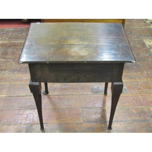 2644 - Georgian oak country made lowboy fitted with three frieze drawers within a shaped frieze raised on f... 