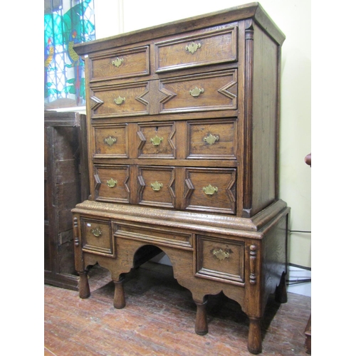 2656 - A Georgian country made oak chest on stand, the upper section of three long and two short drawers an... 