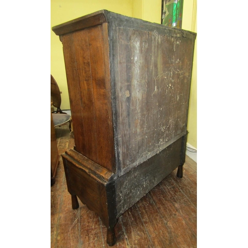 2656 - A Georgian country made oak chest on stand, the upper section of three long and two short drawers an... 