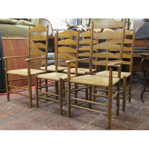 2657 - A set of six (4&2) good quality ashwood ladderback chairs with rush seats on turned supports and rai... 