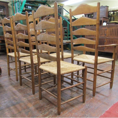 2657 - A set of six (4&2) good quality ashwood ladderback chairs with rush seats on turned supports and rai... 