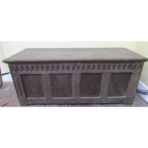 2663 - 18th century oak coffer, the front elevation enclosed by four rectangular panels with repeating geom... 