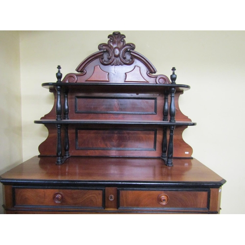 2681 - Mid 19th century continental mahogany chiffonier enclosed by two panelled doors and two frieze drawe... 