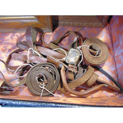 1868 - Suitcase containing 1 pair of bookends, lacquered crumb tray and brush, leather belts. 5 sticks and ... 