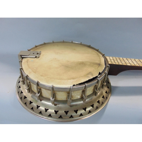 1869 - A Vintage Banjo with chrome mounts and simulated mother of pearl mounts, with canvas and basic lined... 