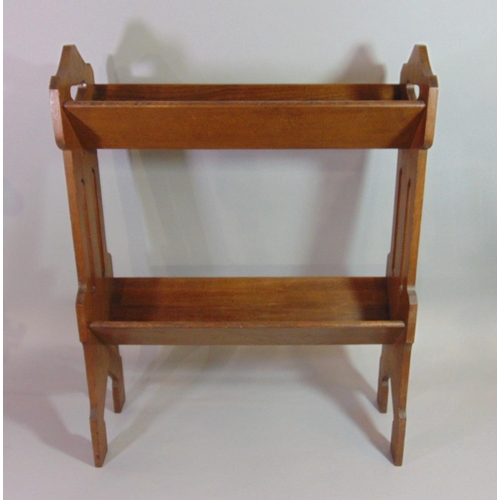 544 - An Arts & Crafts style oak/possibly elm two tier book stand with pierced heart and further detail, 5... 