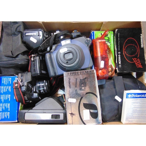 562 - A box of mainly Polaroid instant cameras, plus others