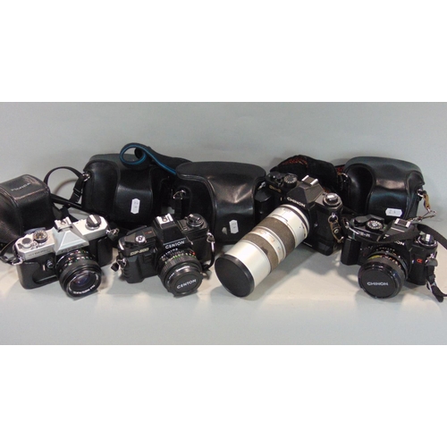 564 - Box of manual SLR cameras to include a Fugica, Shinon, etc, all include lenses.