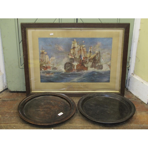 2653 - Two treen trencher/dishes in turned hardwood with moulded outline, 43 cm diameter, and a framed colo... 