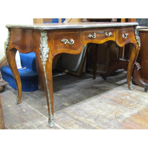 2674 - A French walnut writing desk, the top quarter panelled within wide crossbanded borders over three fr... 