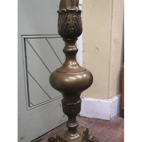 2680 - A brass lamp standard in the form of a 17th century brass pricket candlestand, the spiral twist and ... 