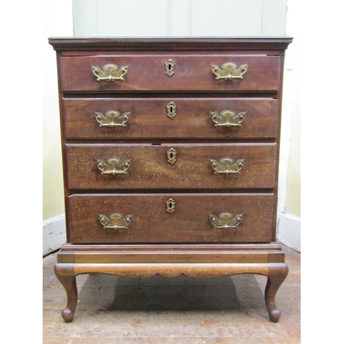 2683 - A Georgian mahogany chest of four long graduated drawers raised on a later stand with short cabriole... 